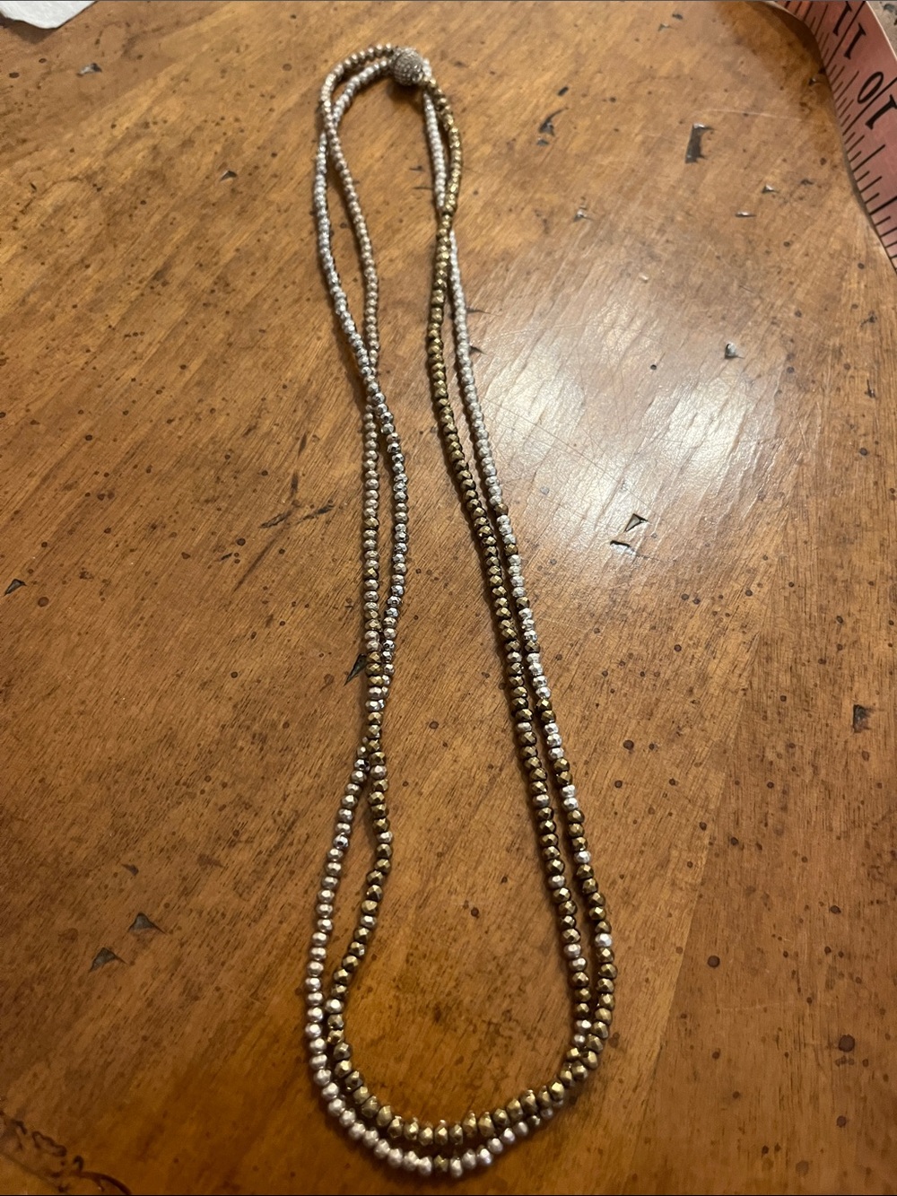 Long beaded necklace with magnetic closure